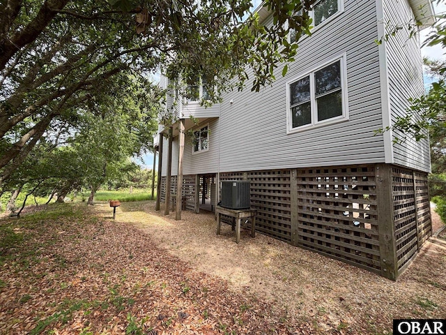 114 Poteskeet Dr Lot 66, Kitty Hawk, NC 27949 - rear view of house with cooling unit