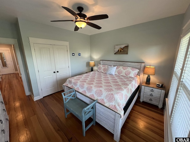 74 Lake Dr, Ocracoke, NC 27960 - bedroom with wood finished floors, a closet, and ceiling fan
