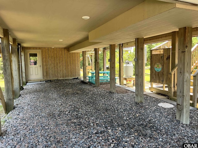 74 Lake Dr, Ocracoke, NC 27960 - view of patio / terrace featuring an attached carport