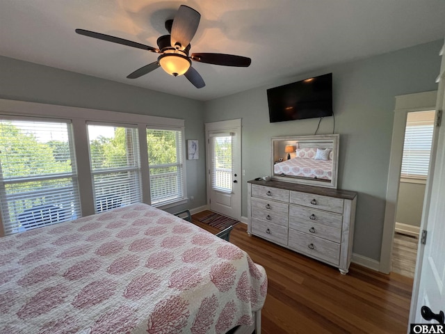 74 Lake Dr, Ocracoke, NC 27960 - bedroom featuring wood finished floors and a ceiling fan