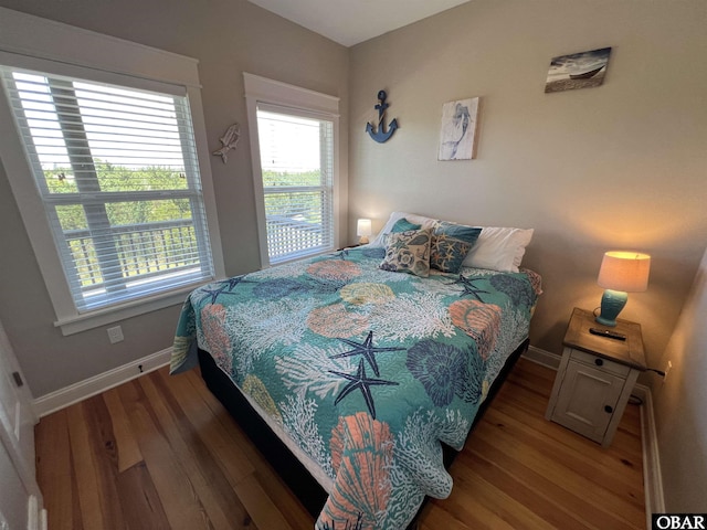 74 Lake Dr, Ocracoke, NC 27960 - bedroom with wood finished floors and baseboards