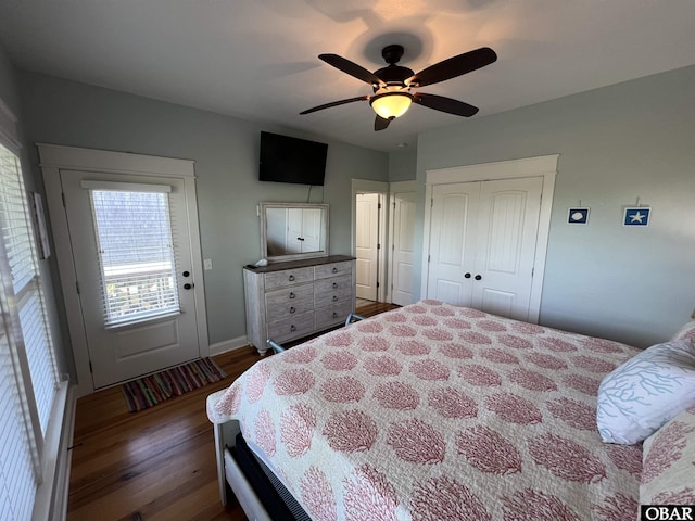74 Lake Dr, Ocracoke, NC 27960 - bedroom featuring dark wood-type flooring, a closet, and ceiling fan