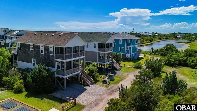 74 Lake Dr, Ocracoke, NC 27960 - aerial perspective of suburban area with a large body of water
