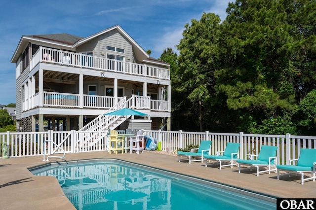 4705 Summer Ln Lot 2, Kitty Hawk, NC 27949 - view of pool featuring stairs, a fenced in pool, and a patio area