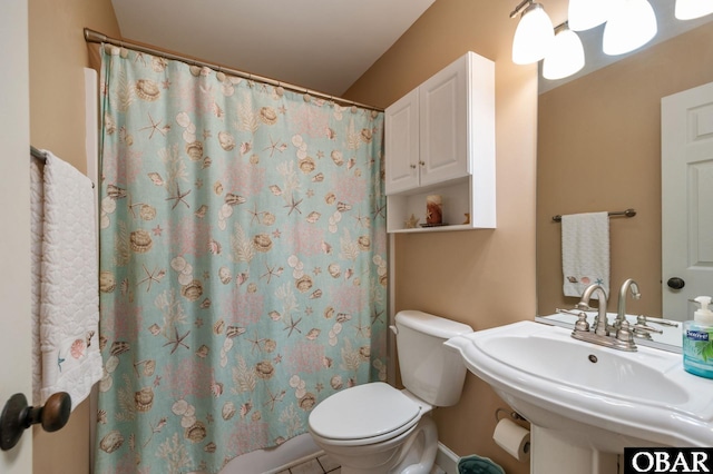 4705 Summer Ln Lot 2, Kitty Hawk, NC 27949 - bathroom featuring a sink, toilet, and a shower with curtain