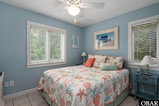 4705 Summer Ln Lot 2, Kitty Hawk, NC 27949 - bedroom with baseboards, light tile patterned flooring, and ceiling fan