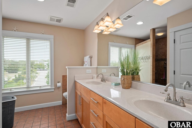 4705 Summer Ln Lot 2, Kitty Hawk, NC 27949 - full bathroom with visible vents, baseboards, and a sink