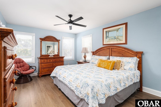 567 Ocean Trl Lot 140, Corolla, NC 27927 - bedroom featuring wood finished floors, baseboards, and a ceiling fan