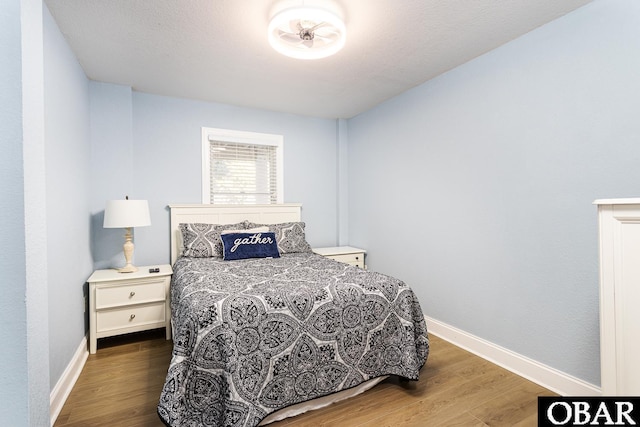 567 Ocean Trl Lot 140, Corolla, NC 27927 - bedroom featuring wood finished floors and baseboards