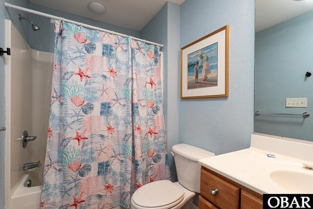 567 Ocean Trl Lot 140, Corolla, NC 27927 - full bathroom featuring vanity, toilet, a textured wall, and shower / bathtub combination with curtain