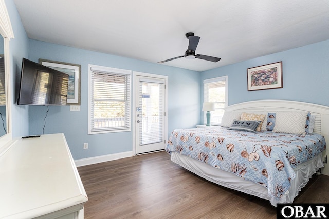567 Ocean Trl Lot 140, Corolla, NC 27927 - bedroom with access to outside, baseboards, wood finished floors, and a ceiling fan