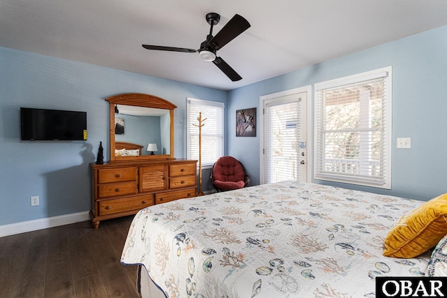 567 Ocean Trl Lot 140, Corolla, NC 27927 - bedroom with dark wood-style flooring, baseboards, access to outside, and a ceiling fan