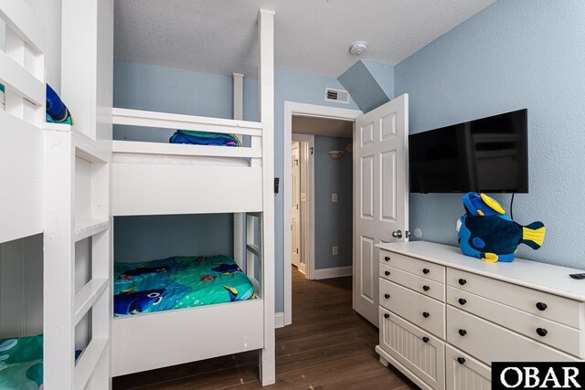 567 Ocean Trl Lot 140, Corolla, NC 27927 - bedroom featuring dark wood-style floors and baseboards