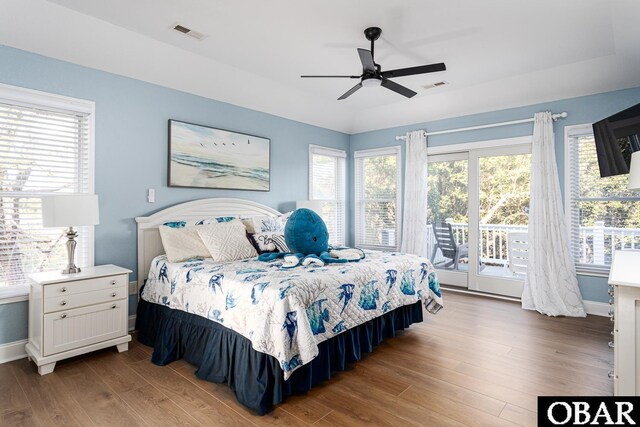 567 Ocean Trl Lot 140, Corolla, NC 27927 - bedroom with access to exterior, wood finished floors, baseboards, and ceiling fan