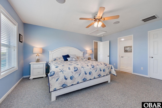 bedroom with baseboards, carpet flooring, visible vents, and attic access