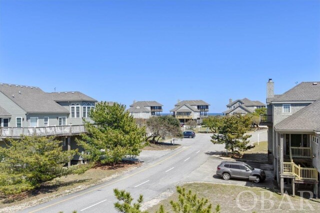 view of road featuring a residential view