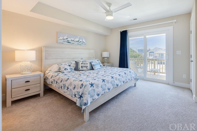 bedroom featuring a ceiling fan, baseboards, visible vents, access to exterior, and carpet