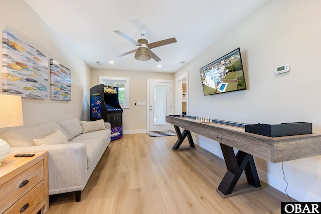 playroom featuring light wood-style floors, recessed lighting, baseboards, and a ceiling fan