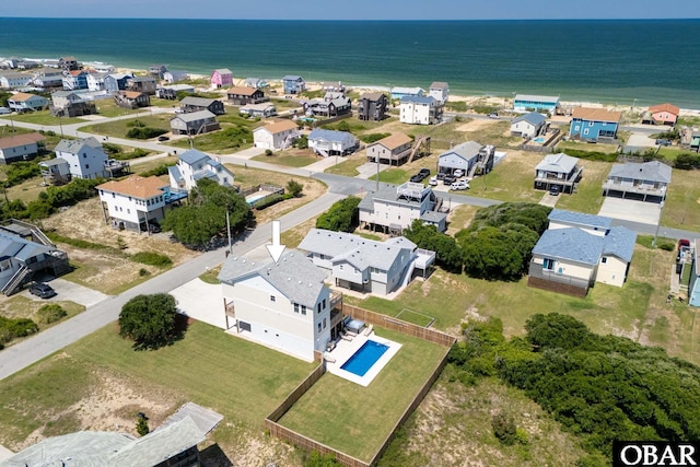 bird's eye view featuring a residential view and a water view