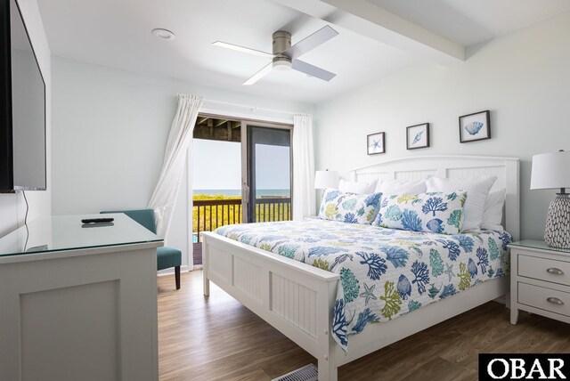 bedroom with dark wood-style floors, access to outside, beam ceiling, and a ceiling fan