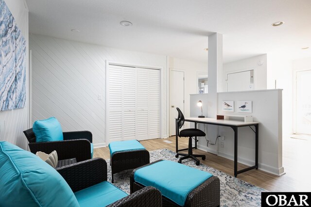 home office featuring light wood-style flooring, baseboards, and recessed lighting