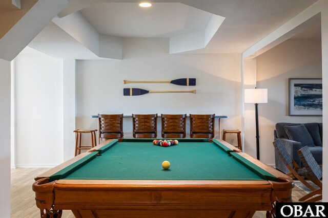 recreation room with light wood finished floors and pool table