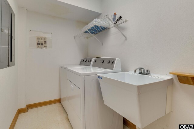 1219 Bismark Dr Lot # 107, Corolla, NC 27927 - laundry area featuring independent washer and dryer and electric panel