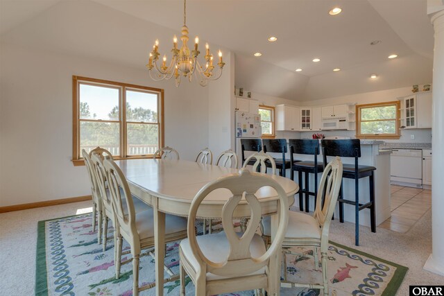 1219 Bismark Dr Lot # 107, Corolla, NC 27927 - dining room featuring plenty of natural light, a chandelier, recessed lighting, lofted ceiling, and light carpet