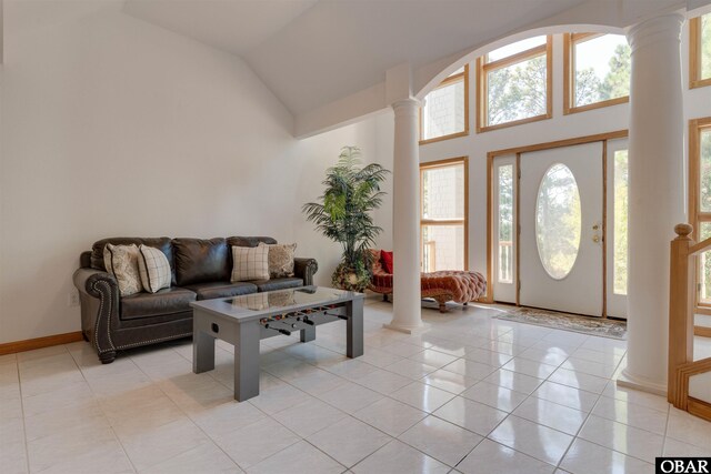 1219 Bismark Dr Lot # 107, Corolla, NC 27927 - entryway featuring decorative columns, light tile patterned floors, and high vaulted ceiling