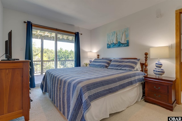 1219 Bismark Dr Lot # 107, Corolla, NC 27927 - bedroom with carpet floors and access to outside