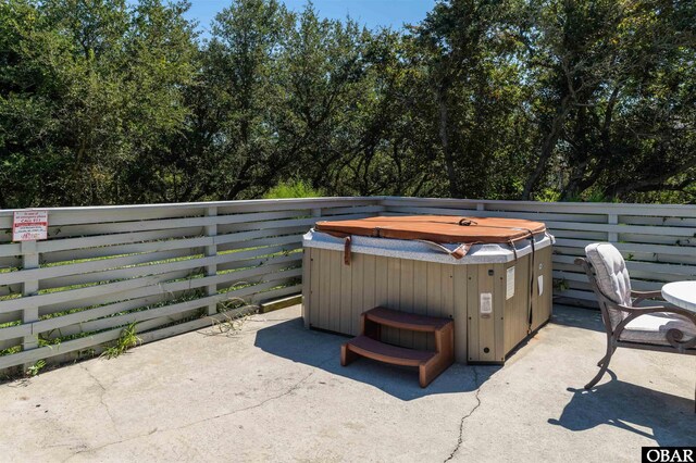 1219 Bismark Dr Lot # 107, Corolla, NC 27927 - view of patio / terrace featuring a hot tub