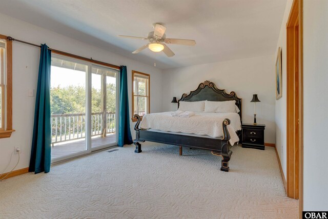 1219 Bismark Dr Lot # 107, Corolla, NC 27927 - bedroom with access to outside, carpet flooring, and a ceiling fan