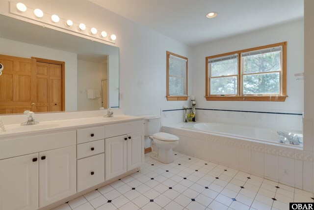1219 Bismark Dr Lot # 107, Corolla, NC 27927 - bathroom with a bath, double vanity, tile patterned floors, and recessed lighting