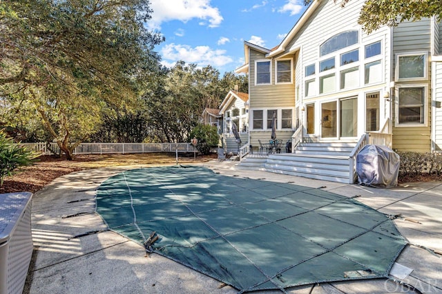 view of swimming pool with a fenced in pool, a patio area, fence, and area for grilling