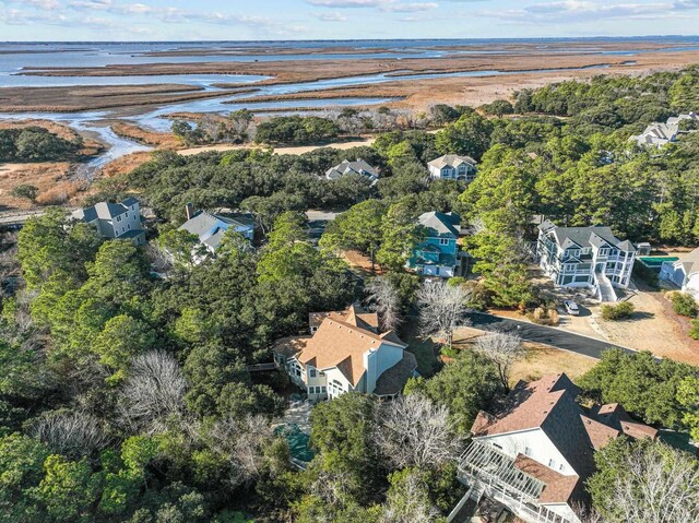 aerial view featuring a water view and a residential view