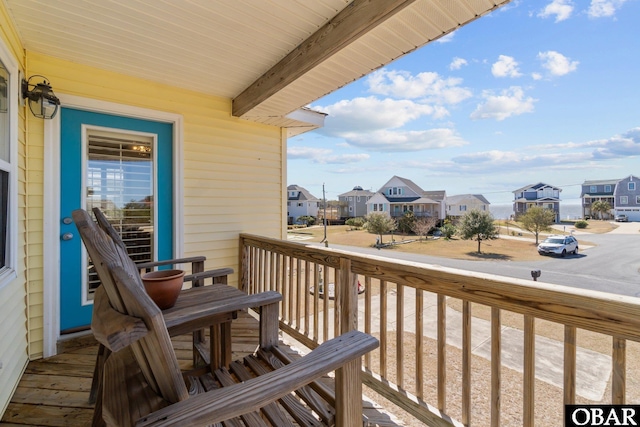 balcony featuring a residential view