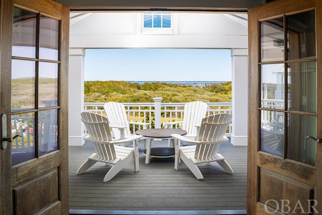 sunroom / solarium featuring plenty of natural light