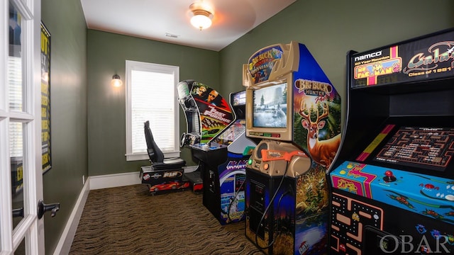 playroom with carpet, visible vents, and baseboards