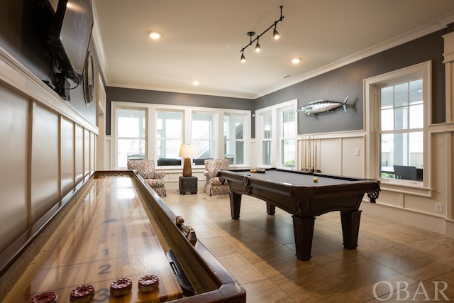 recreation room featuring crown molding, pool table, a healthy amount of sunlight, and a decorative wall