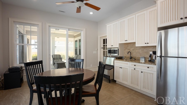 dining area featuring a ceiling fan, recessed lighting, and visible vents