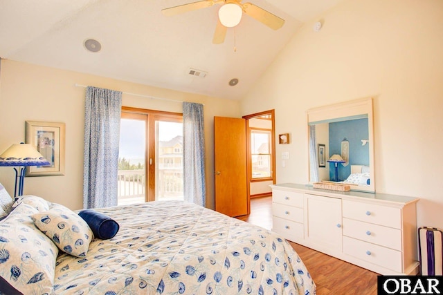 bedroom with visible vents, ceiling fan, access to exterior, light wood-type flooring, and high vaulted ceiling