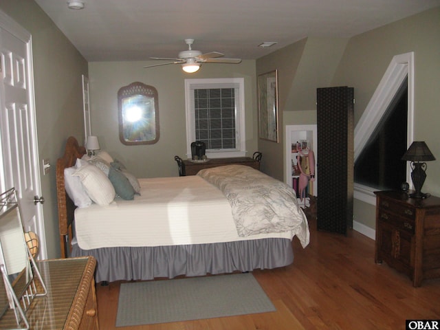 bedroom featuring ceiling fan and wood finished floors