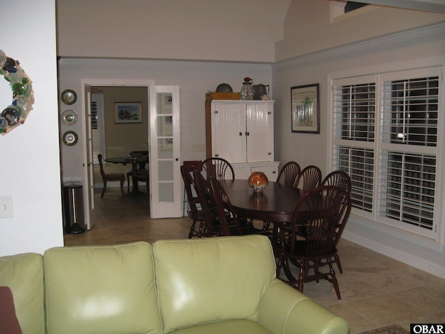 dining space with tile patterned floors