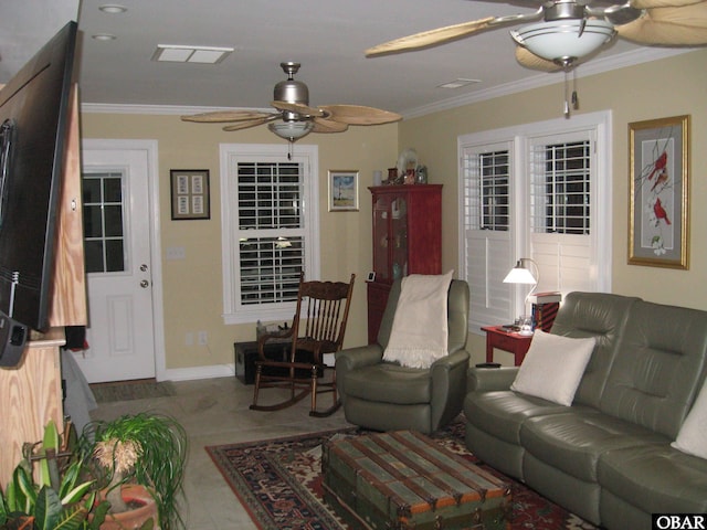 living area with ceiling fan, visible vents, and ornamental molding