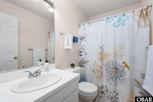 bathroom with vanity, toilet, and a shower with curtain