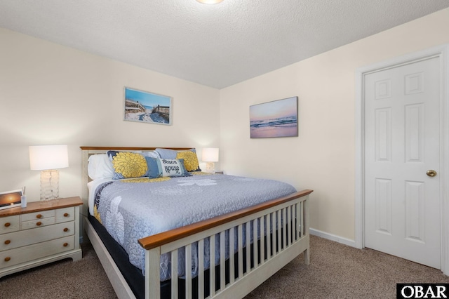 bedroom with carpet floors and baseboards