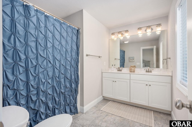 5009 Lindbergh Ave Lot 28, Kitty Hawk, NC 27949 - bathroom with double vanity and curtained shower