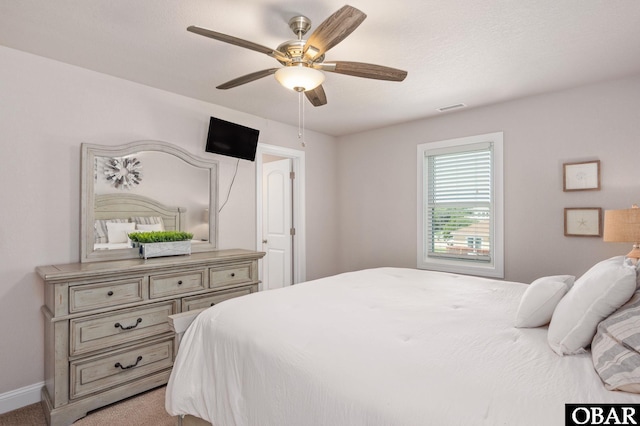 5009 Lindbergh Ave Lot 28, Kitty Hawk, NC 27949 - bedroom with a ceiling fan and light colored carpet