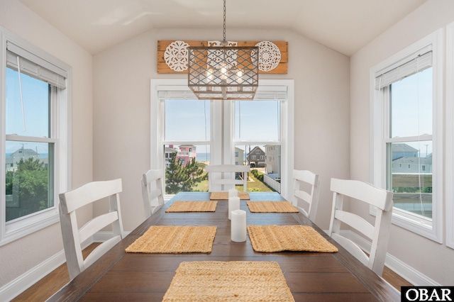 5009 Lindbergh Ave Lot 28, Kitty Hawk, NC 27949 - dining space featuring vaulted ceiling, plenty of natural light, and wood finished floors
