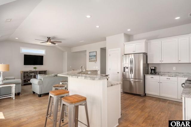 5009 Lindbergh Ave Lot 28, Kitty Hawk, NC 27949 - kitchen with stainless steel refrigerator with ice dispenser, ceiling fan, light wood-type flooring, white cabinets, and recessed lighting